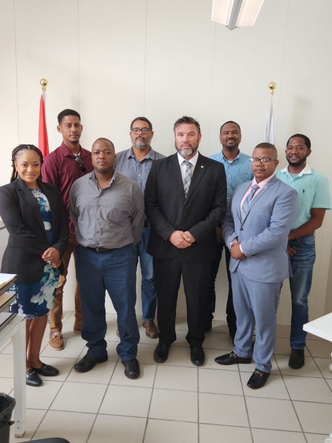 In the photo from the left, Interim Director of BTP Judianne Labega - Hoeve, Jobern Gumbs, Ardin Richardson, Mr Sidney de Weever Head of the Technical Department of BTP, Minister of TEATT Arthur Lambriex,  Damien Harrigan, TEATT Cabinet Chief Of Staff Francisco Lacroes, and Travis Carty. 