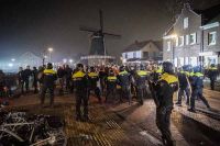 Riot police break up the party in Dalfsen. PHoto: Roland Heitink ANP/HH  